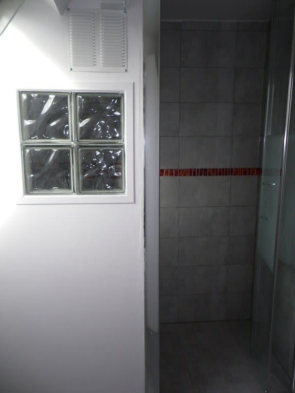 Salle de bain après travaux, Rénovation appartement à Gare d’Asnières sur Seine de 25m²