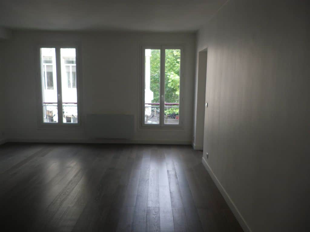 Salon après travaux, Rénovation appartement de 50m² au quartier Pont de Neuilly à Neuilly sur Seine 92200