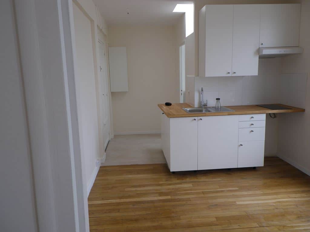 Salon après travaux, Rénovation appartement quartier Pont de Levallois-Bécon à Levallois Perret de 30 m2