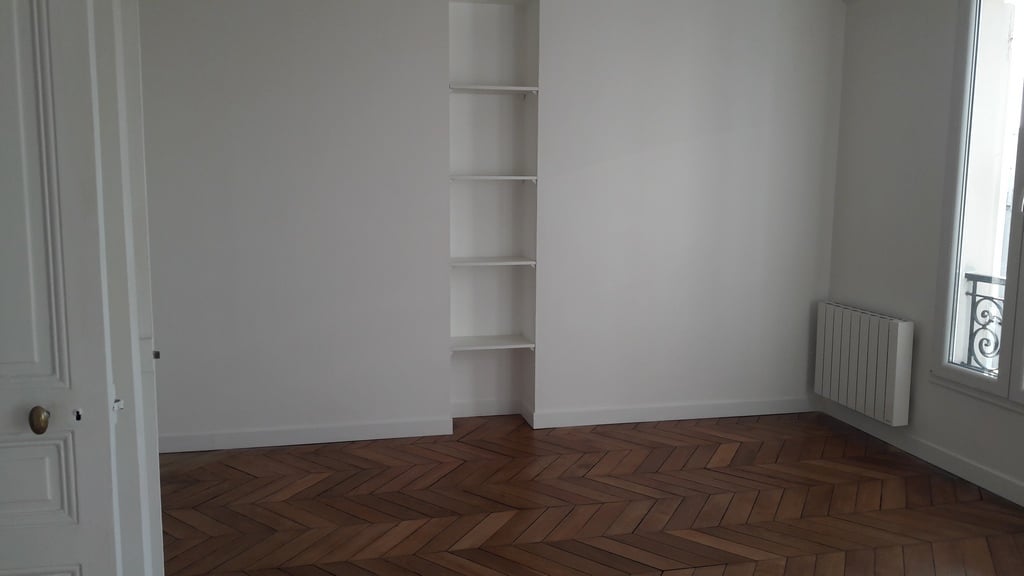 Salon après travaux, Rénovation appartement à LEVALLOIS PERRET proche NEUILLY SUR SEINE de 70 m2