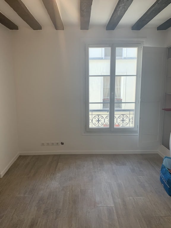 Salon après travaux (vue 2), Rénovation studio quartier Saint Michel PARIS 75005 de 25 m2